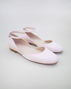 Inspired by a contemporary and refined ballet style flat. Classic silky satin round toe flat with removable ankle strap brings an elevated elegance and makes this a classy and elegant shoes for wedding, evening wear, or romantic date.DETAILS:UPPER: Synthetic upper and liningMATERIALS: Manmade outsoleHEEL HEIGHT: 0.5"Imported Material Affordable Slip-on Formal Flats, Luxury Pink Closed Toe Flats, Cheap Pink Round Toe Dance Shoes, Blush Bridal Shoes Flats, Elegant Flat Shoes Round Toe, Pink Wedding Flats For Bride, Shoes For Brides, Shoes For Wedding, Ballet Style