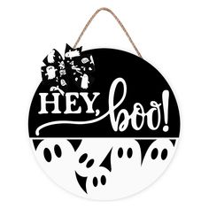 a black and white sign that says hey boo