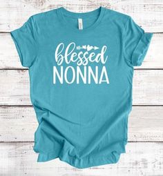 Blessed Nonna shirt Listing is made using a Bella Canvas Tee in heather colors These tees are 52% cotton and 48% polyester and they are super soft Image is applied using heat transfer vinyl. I will include care instructions in the package. Sizes available are X-Small to 4X Please refer to sizing charts for correct size. Since this item is handmade please allow extra time for shipping. All tees used in my shop are in UNISEX sizing. Please be sure to view the sizing charts to get the right size. T Casual T-shirt For Mother's Day Family Gatherings, Blessed Grandma, Nana Shirts, Grandma Shirt, Grandma Shirts, Grandma Gift, Bella Canvas Tees, Transfer Vinyl, Size Charts