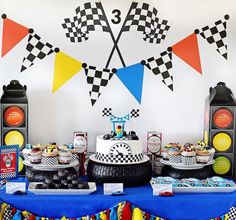 a race themed birthday party with cars and flags