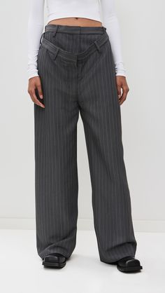 Find ACNE STUDIOS Deconstructed Trousers on Editorialist. Fabric: Heavyweight, non-stretch suiting. Layered waist. Pinstripe pattern. Wide-leg. Hook-and-eye closures at waist, zip fly. Slant hip pockets. Shell: 67% viscose/26% wool/7% polyester. Dry clean. Made in Portugal. Measurements: Measurements from size 34 Rise: 11.5in / 29cm Inseam: 30.25in / 77cm Leg opening: 22.75in / 58cm Pinstripe Office Bottoms With Belt Loops, Tailored Striped Bottoms With Belt Loops, Striped High-waisted Wide Leg Pants For Work, Chic Tailored Bottoms With Vertical Stripes, Formal Striped Bottoms With Belt Loops, Elegant Striped Office Pants, Elegant Vertical Stripes Pants For Office, Elegant Striped Pants For Office, Elegant High-waist Pinstripe Pants