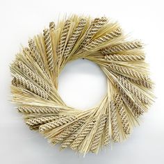 a close up of a wreath made out of straw