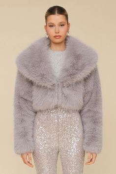 Snuggly soft faux fur exudes old Hollywood glamour cut in a cropped silhouette. Features a shawl collar, hook-and-eye closure, and a fully-lined interior for a polished finish. Perfect finishing touch to your holiday outfits. Available in baby pink and cloud grey. Style #: 84235 Cropped Faux Fur Coat, Shawl Collar Jacket, Faux Fur Shawl, Faux Fur Cropped Jacket, Fur Shawl, Grey Style, Collar Jacket, Leather Trench Coat, Old Hollywood Glamour