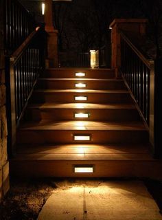 some steps lit up with lights in the dark