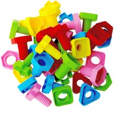 many different colored plastic toys are stacked on top of each other in the shape of letters