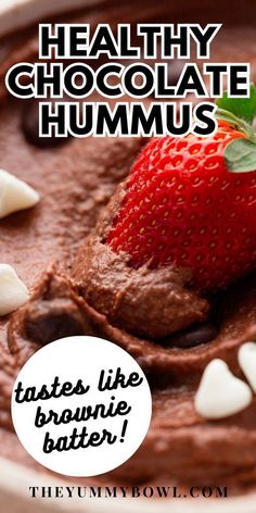 chocolate hummus in a bowl with a strawberry on top and the text healthy chocolate hummus tastes like brownie batter