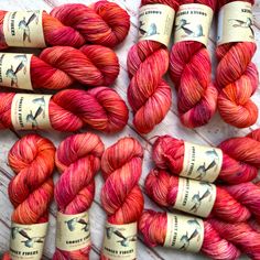 several skeins of red and orange yarn