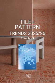 the book title for tile pattern trend 2020 / 26 is displayed in front of a table and bench