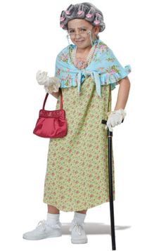 an old woman in a dress holding a cane and a handbag on her hip