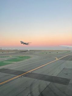 an airplane is taking off from the runway