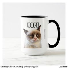 a grumpy cat mug with the caption good morning no such thing