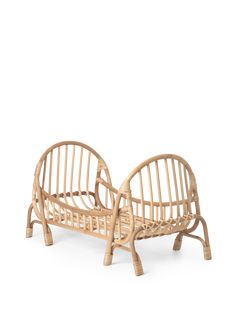 two wicker beds sitting next to each other on top of a white flooring