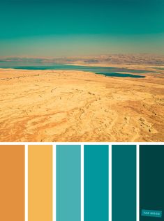 an aerial view of the desert with blue, yellow and green colors in it's palette