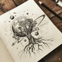 an ink drawing of a tree with planets in the background