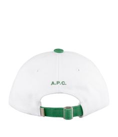 a white and green hat with the word apc on it's front side