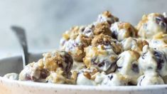 a white bowl filled with chocolate chip salad