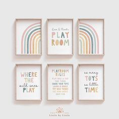 four framed wall art pieces with rainbows and words on the sides, one saying play room