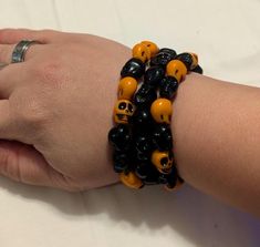 A set of 3 orange and black skull beaded bracelets, perfect gift for the Halloween season. Halloween Beads, Black Skull, Bracelets Set, Beaded Skull, Black Skulls, Halloween Season, Bracelet Set, Jewelry Bracelets, Beaded Bracelets