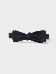 Polish off your classic look wearing a bow tie crafted from black silk satin. Hand-tied with attention to its elegant details, this bow tie makes a sophisticated statement at formal events. 100% silk satin Adjustable neck size 14 - 20 inches Self-tie Suit Prom, Tie Crafts, Black Tux, Tuxedo Shirts, Wedding Rentals, Prom Wedding, Black Silk, Black Satin, Silk Satin