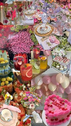 a table filled with lots of different types of cakes and desserts next to each other