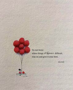 a red balloon floating in the air with a quote on it