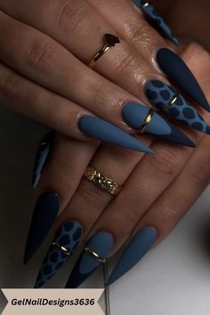 Stylish matte nails with bold designs and sleek finishes, offering a modern and sophisticated look for any occasion. French Tips Pointy Nails, Studs On Nails, Navy Leopard Print Nails, Beyonce Nails Designs, Teal New Years Nails, Monochromatic Nail Art, Villain Era Nails, Teal And Burgundy Nails, Matt Finish Nails