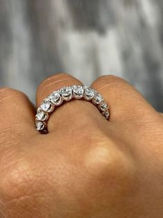 Get ready to dazzle this Thanksgiving with our 5 Carat Oval Cut Diamond Eternity Wedding Band! The minimalist design makes it perfect for any occasion. Made with lab-grown diamonds, this handmade fine jewelry piece is both ethical and stunning. Surprise her with this unique anniversary band or give it as a thoughtful gift. Grab yours now and make a statement! 𝐅𝐞𝐚𝐭𝐮𝐫𝐞𝐬:• 𝐌𝐚𝐝𝐞 𝐭𝐨 𝐎𝐫𝐝𝐞𝐫• 𝐌𝐞𝐭𝐚𝐥: 𝟏𝟒𝐊 𝐆𝐨𝐥𝐝 | 𝟏𝟖𝐊 𝐆𝐨𝐥𝐝 | 𝟗𝟓𝟎 𝐏𝐥𝐚𝐭𝐢𝐧𝐮𝐦• 𝐁𝐚𝐧𝐝 𝐂𝐨𝐥𝐨𝐫? Oval Eternity Band Stacked, Oval Eternity Band, Eternity Band Stack, Diamond Eternity Wedding Band, Dainty Diamond Ring, Stacked Wedding Rings, Eternity Ring Gold, Oval Diamond Ring, Basket Setting