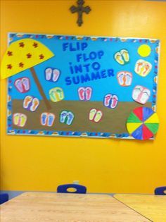 a bulletin board with flip flops and umbrellas on it in a classroom setting