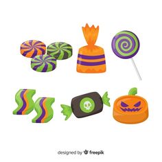 various halloween candies and lollipops on a white background