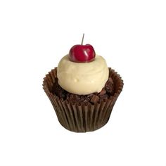 a cupcake with white frosting and a single cherry on top is shown in front of a white background