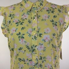 Elle Womens Top Size Large Yellow Floral Flutter Sleeve Button Up Across The Chest Approx 21" Length Approx 29" Sleeves Approx 1.5" Cheap Printed Button-up Blouse, Ruffle Top Blouses, Long Tunic Tops, Lace Short Sleeve Top, Peplum Styling, Cold Shoulder Long Sleeve, Black And White Tops, Black Lace Tops, Floral Sleeveless