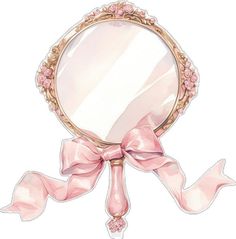 a mirror with a pink bow around it