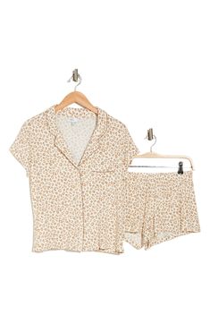 Get that chic put-together feel even in your jammies with this lightweight printed set. Top: 25" length (size S); Bottom: 10.5" rise, 3" inseam Top has notch lapel, short sleeves, and front patch pocket Bottom has elasticized waist and allover print 95% rayon, 5% spandex Machine wash Imported Model stats: 5'10", Bust: 32", Waist: 25", Hip: 36". Model is wearing size S. Casual Beige Set For Sleepover, White Floral Print Pajama Shorts For Loungewear, Cream Summer Loungewear Set, Beige Relaxed Fit Sleepwear Sets, Casual Cream Sleepwear, Cream Summer Sleepwear For Lounging, Beige Pajama Shorts For Spring Loungewear, Casual Cream Sets For Pajama Party, Casual Cream Pajama Party Sets