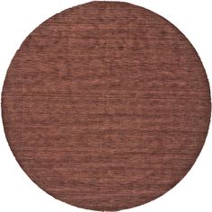 a round rug in brown on a white background