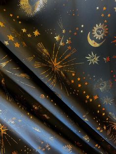 the fabric has stars and fireworks all over it