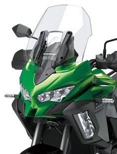 the front view of a green motorcycle with clear windshields and headlamps on