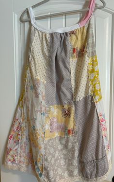 This item was created from up cycled clothing and materials. The patchwork fabric is very lightweight with lace at the hemline.  A cool open sundress. Approximate measurements :  Bust area:  19" stretches to 22" plus Length:  35" Size:  Medium to Large Thank you for visiting, please message me with any questions. Quilt Dress, Repurposed Clothing, Patchwork Fabric, Cycling Outfit, Upcycle Clothes, Dress Clothes For Women, Clothing For Women, Tunic Dress, Chic Outfits