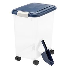 a plastic storage box with wheels and a shovel