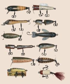 several different types of fishing lures hanging from hooks