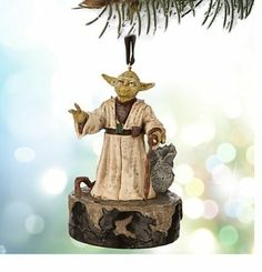 a star wars ornament hanging from a christmas tree