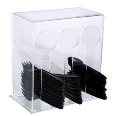 a clear box with black and white plates in it