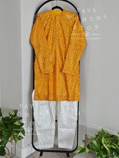 This kurta is customized for standard size Medium. Full Sleeves Pattern Please ask for measurements if needed. Cotton Long Sleeve Kurta With Gota Work, Long Sleeve Cotton Kurta With Gota Work, Traditional Pant Set With Mirror Work, Traditional Long Sleeve Pant Set With Mirror Work, Cotton Pant Set With Zari Work And Long Sleeves, Fitted Long Sleeve Pant Set For Diwali, Festival Long Sleeve Pant Set With Chikankari Embroidery, Yellow Long Sleeve Pant Set For Festive Season, Fitted Cotton Kurta With Mirror Work