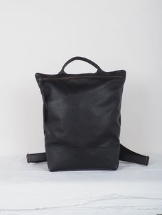 "Black Leather backpack purse women, laptop backpack, zipper backpack, backpack bag, handmade backpack, black leather backpack, minimal bag Handmade HIBRID black Leather Backpack is characterized by its hand crafted and material quality and locally sourced. Large capacity backpack designed with cowleather. Details: Back metalic Zipper clousure. Zipper pocket on the back. Inside leather pocket smartphone size Leather handel and black cotton straps + black leather adjustable. * Color: base black c Minimalist Leather Backpack For Daily Use, Minimalist Everyday Backpack, Minimalist Leather Backpack For On-the-go, Minimalist Black Leather Backpack For Travel, Minimalist Backpack With Adjustable Strap, Minimalist Backpack For Everyday Use, Minimalist Backpack For Daily Use, Minimalist Everyday Standard Backpack, Minimalist Black Leather Backpack For Daily Use