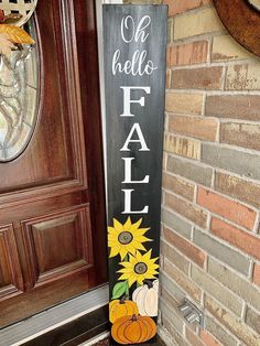 a wooden sign that says, oh hello fall with sunflowers and pumpkins