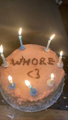 a birthday cake with lit candles on it that says, more than 3 o'clock