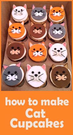 a box filled with cat cupcakes sitting on top of a table