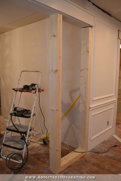 a ladder is in the middle of a room being remodeled with new walls and flooring