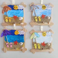 four little wooden frames with beach scenes on them