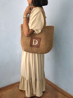 ✔️I made this beautiful bag from camel natural paper rope which is organic cotton. ✔️The interior of the straw summer bag has a magnetic button. Suitable for use as shoulder bag, beach bag or party bag ✔️There is a small vegan leather pocket on the front of the bag. ✔️I can add your initials on the leather pocket. You can personalize the letter. ✔️You can combine your clothes with a straw summer bag on summer days ✔️Handcrrafted in Turkey ✔️Hand-crocheted with care ✔️This bag is light weight yet durable, breathable and environmental at the same time. ✔️The bag hasn't  lining. But the bag has cotton lining option. ✔️This bag has a packable form and does not take up space in the suitcase. Unique for holidays ! ✔️Due to differences in shooting light and monitors, there may be color difference Casual Brown Beach Bag In Natural Fiber, Everyday Sand-colored Straw Tote Bag, Large Capacity Beige Crochet Bag In Natural Fiber, Casual Natural Straw Bag With Leather Handles, Neutral Straw Bag For Beach Vacation, Neutral Crochet Tote Bag For Vacation, Casual Crochet Paper Straw Travel Bag, Neutral Crochet Bag For Summer Vacation, Neutral Crochet Shoulder Bag For Beach