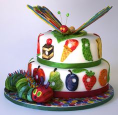 the very colorful cake is made to look like it has many different things on it